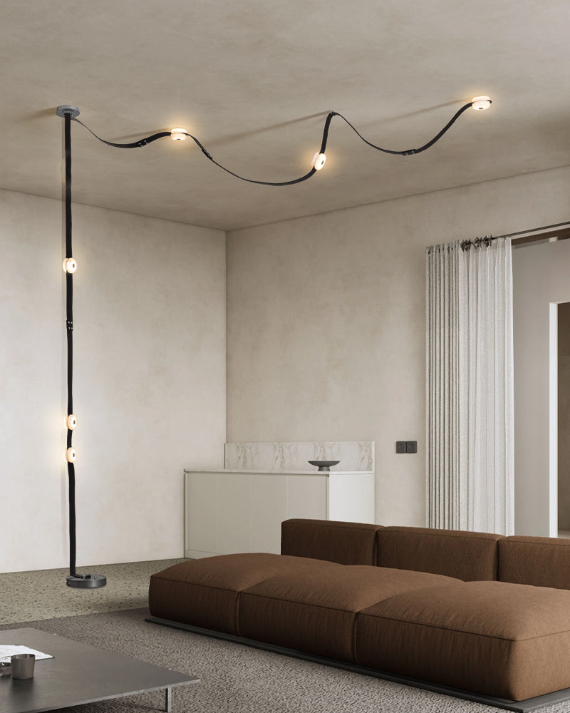 Hubbardton Forge Snaps Small LED Floor-to-Ceiling Light in Brown Leather Finished