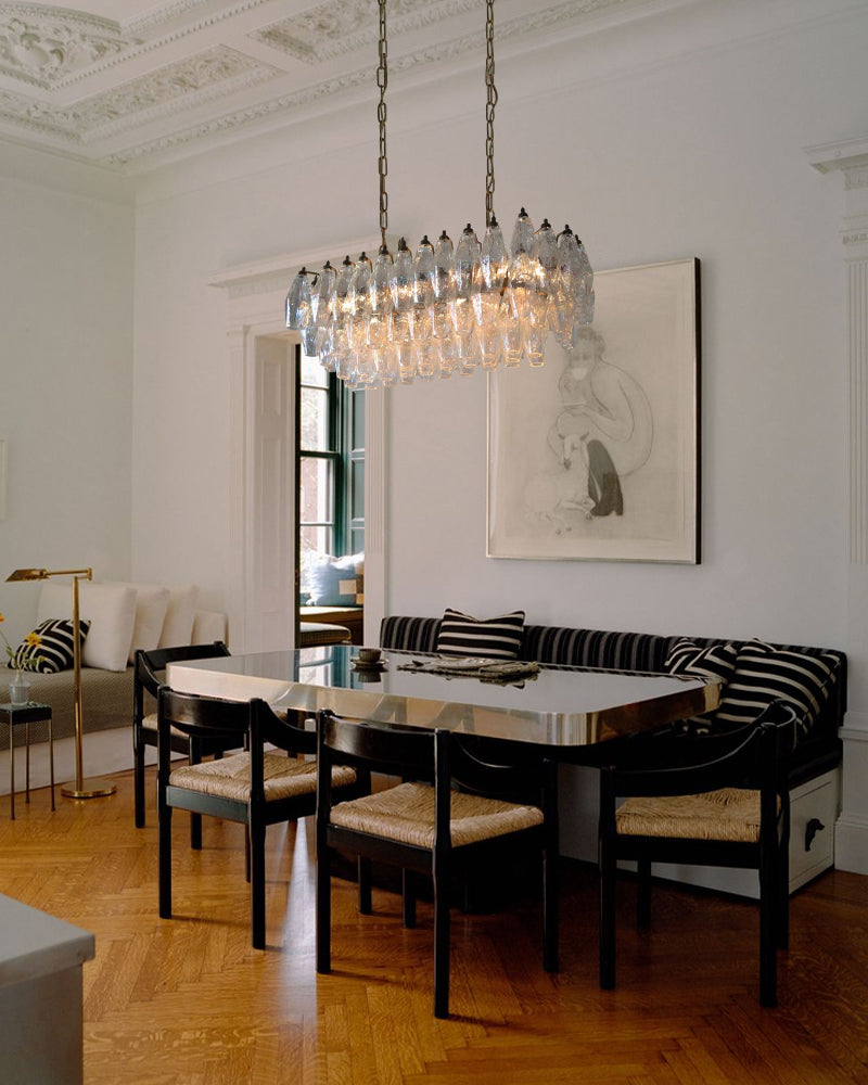 Dining room with a large chandelier