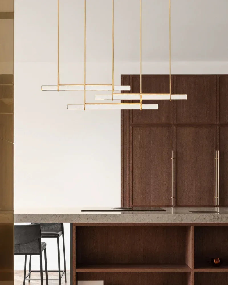 Valence Series Architectural Linear Chandelier | Triple Bar Prism Meticulously crafted clear prisms with vertical brass drops, Lacquered Burnished Brass and Black for Dining Rooms and Kitchen Islands American chandelier