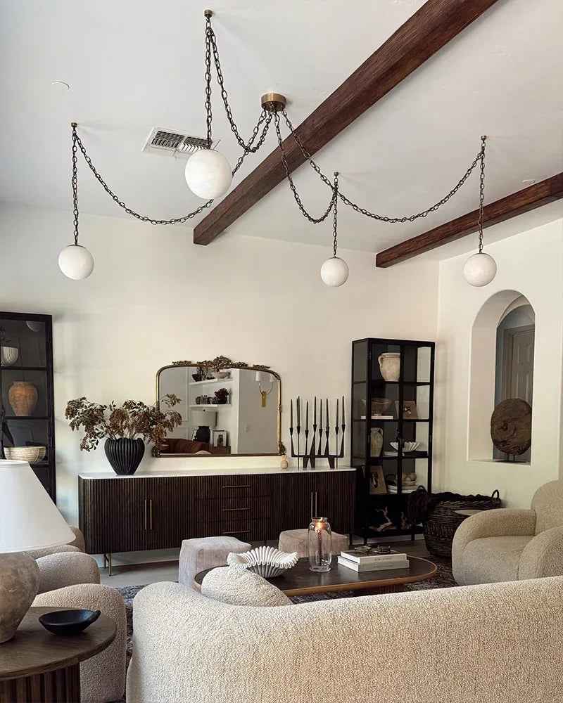 LightsStory Series Ethereal Chandelier | Globe Hand-Carved Natural Alabaster, Brass and Black finish for Grand staircases, high ceilings, and modern entryways Modern Pendant lamp