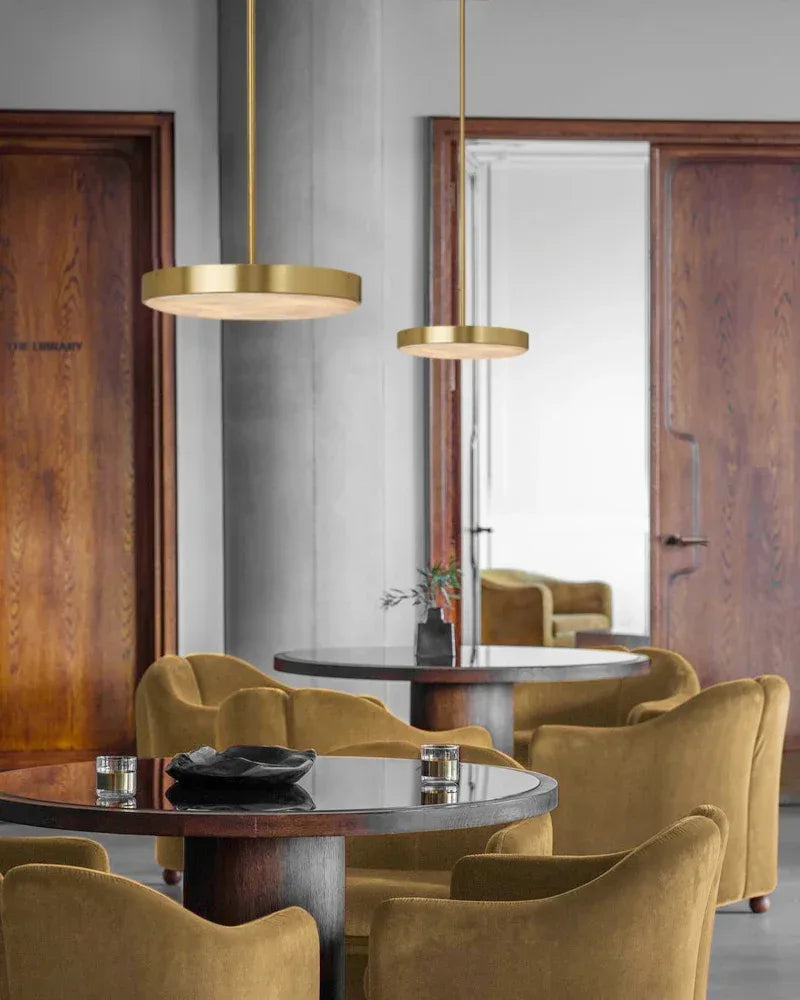 Knokke Series Ethereal Pendant Light | Natural Alabaster Dome Hand-honed natural alabaster disc, Satin brass finish for Dining tables, kitchen islands, and bedrooms Modern Pendant lamp