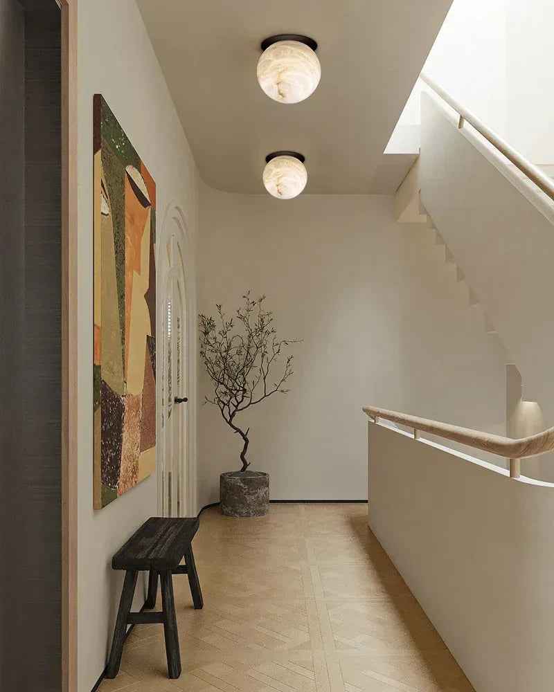 LightsStory Series Ethereal Wall Light | Alabaster Globe Hand-Carved Natural Alabaster Stone, Antique Black Iron finish for Hallways and Entryways Flush Mounted Wall Sconce Lamp