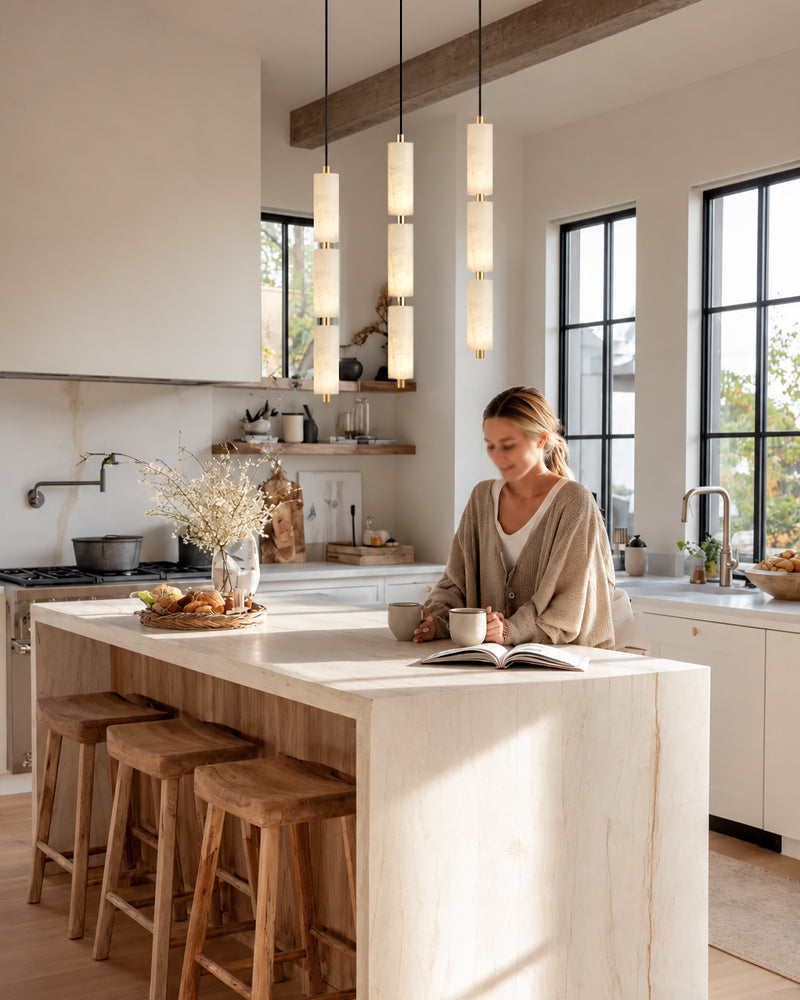 Brass-trimmed cylinder pendant light cluster with vertical alabaster glass shades