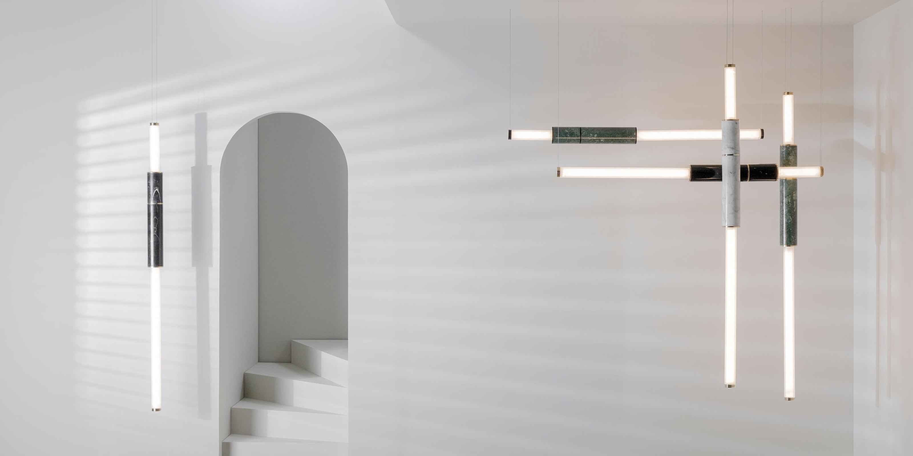 Two light pipes with polished marble segments and frosted glas