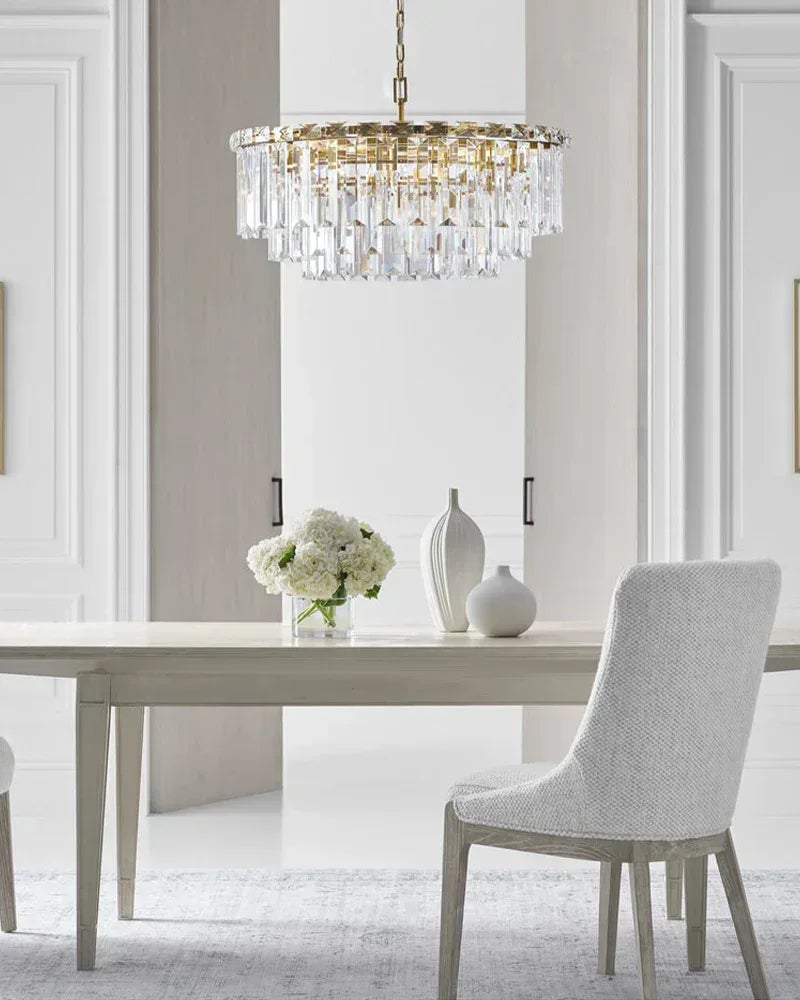 Gstaad Series Grand Chandelier | Tiered Cut-Clear Glass Layered tiers of cut-clear glass crystals with a solid stainless steel frame, Gold, Black, and Chrome Stainless finish for Entryways, dining rooms, and great rooms American chandelier