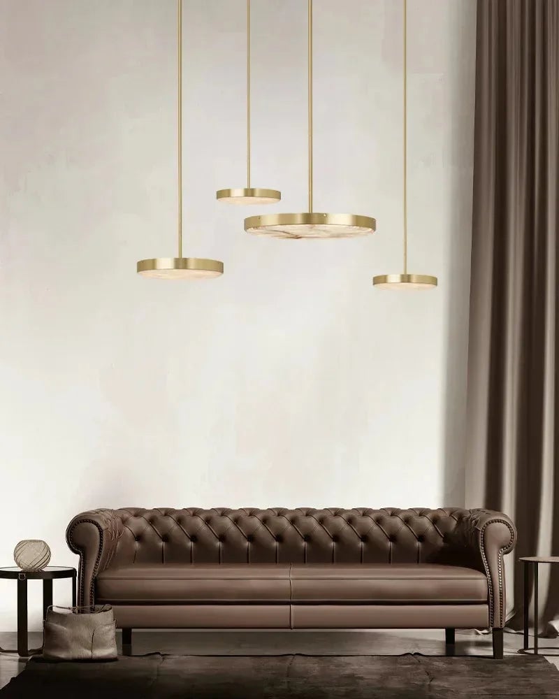 Knokke Series Ethereal Pendant Light | Natural Alabaster Dome Hand-honed natural alabaster disc, Satin brass finish for Dining tables, kitchen islands, and bedrooms Modern Pendant lamp