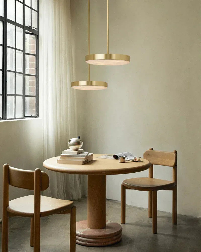 Knokke Series Ethereal Pendant Light | Natural Alabaster Dome Hand-honed natural alabaster disc, Satin brass finish for Dining tables, kitchen islands, and bedrooms Modern Pendant lamp