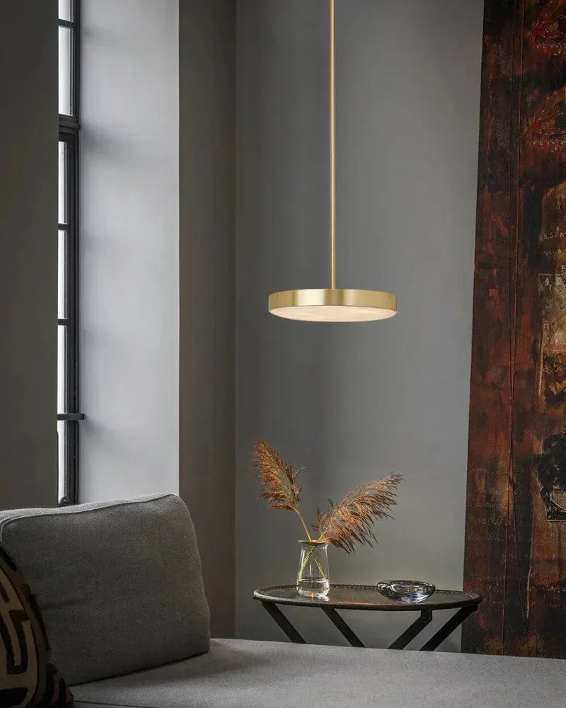 Knokke Series Ethereal Pendant Light | Natural Alabaster Dome Hand-honed natural alabaster disc, Satin brass finish for Dining tables, kitchen islands, and bedrooms Modern Pendant lamp