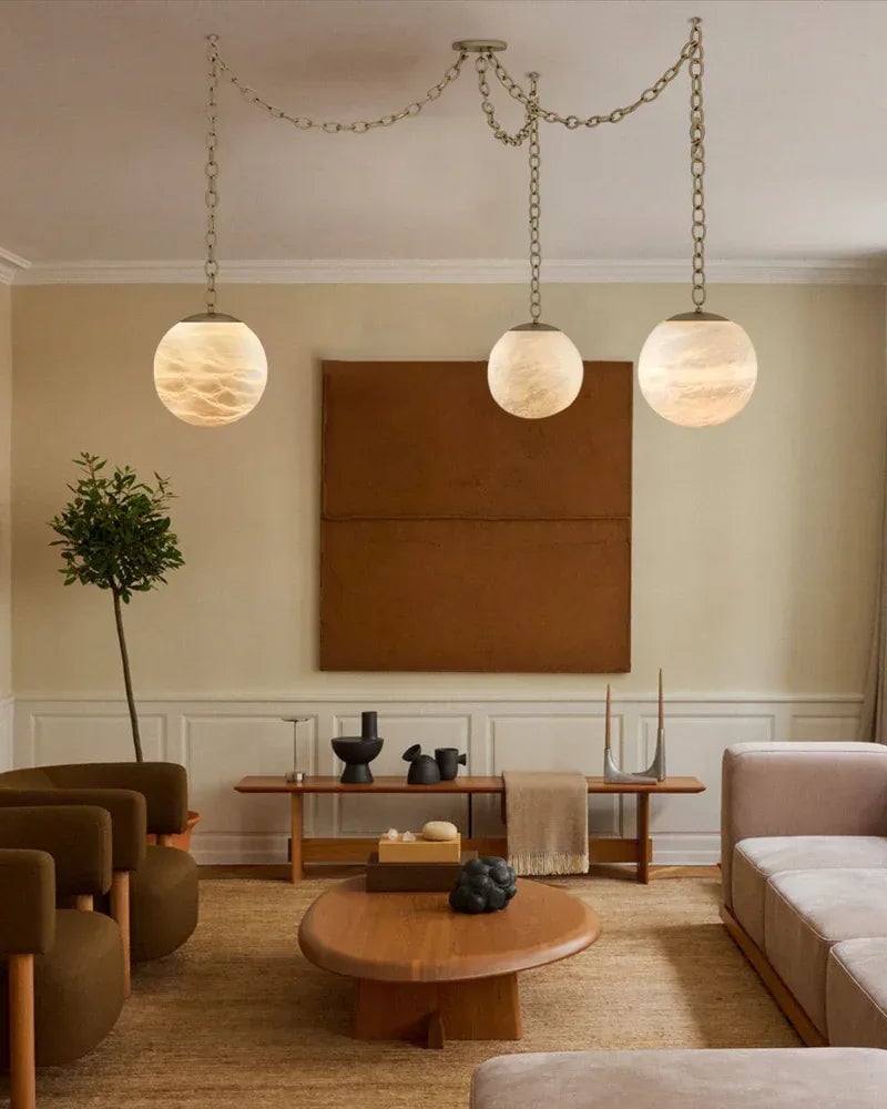 LightsStory Series Ethereal Chandelier | Globe Hand-Carved Natural Alabaster, Brass and Black finish for Grand staircases, high ceilings, and modern entryways Modern Pendant lamp
