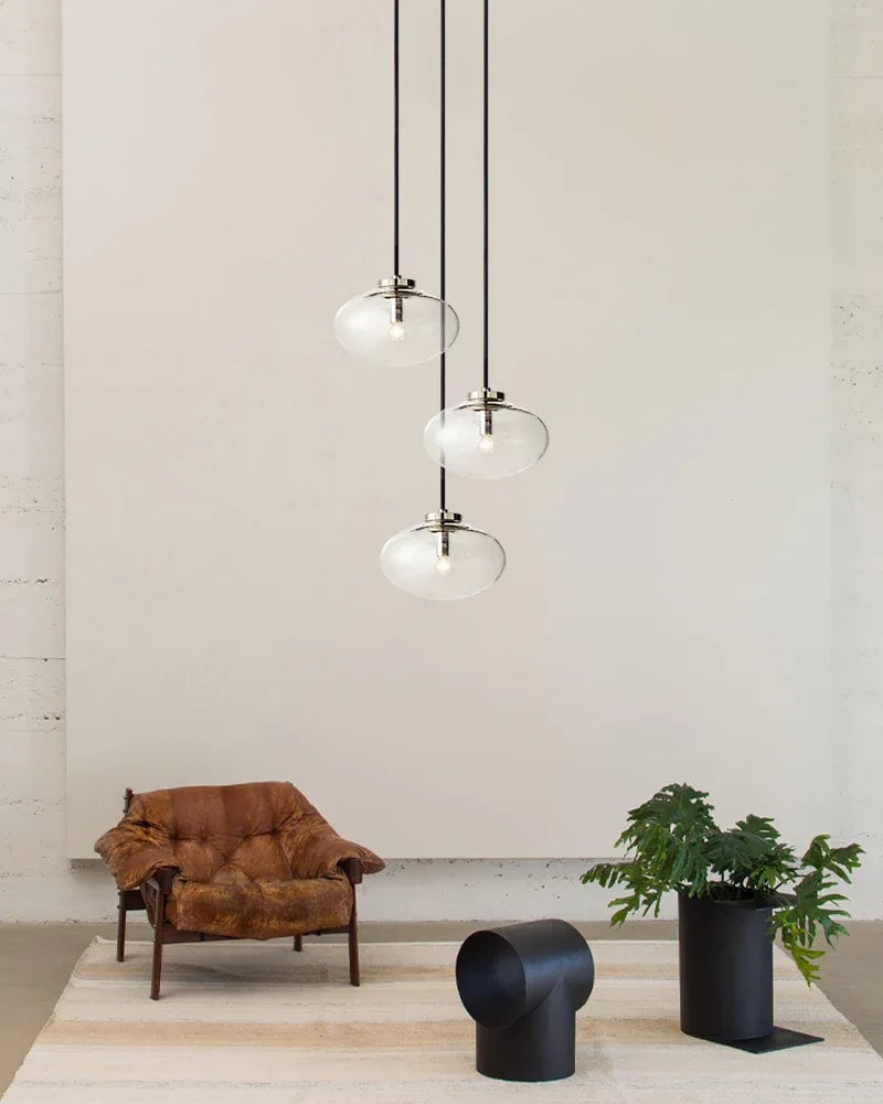 LightsStory Series Sinuous Pendant Light | Oval Handblown Glass Handblown clear glass with brass, black, and silver metal frame, Mixed Brass, Black, and Silver finish for Kitchen Islands and Dining Areas Modern Pendant lamp