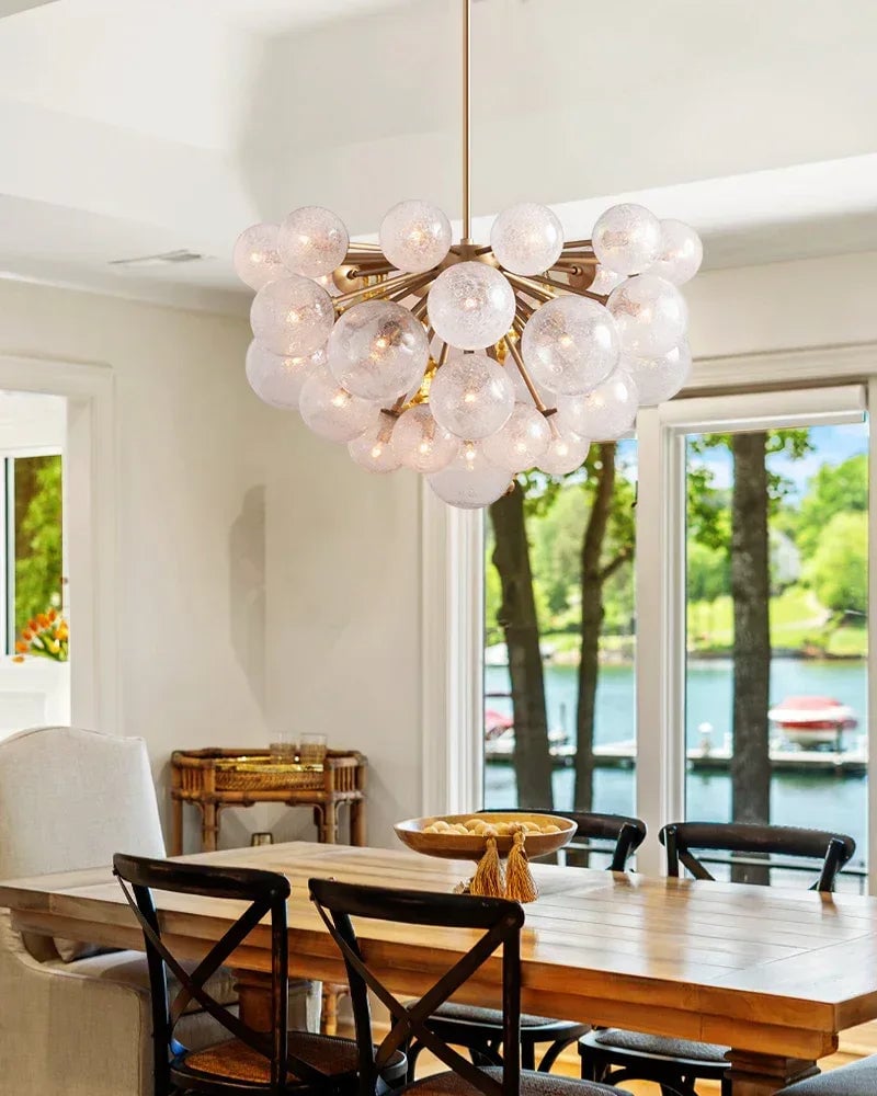 Megève Series Ethereal Chandelier | Linear Reactive hand-blown bubble glass with brushed steel, Brushed brass, black, or silver steel finish for Dining rooms, entryways, and open-concept living spaces American Vintage chandelier lamp