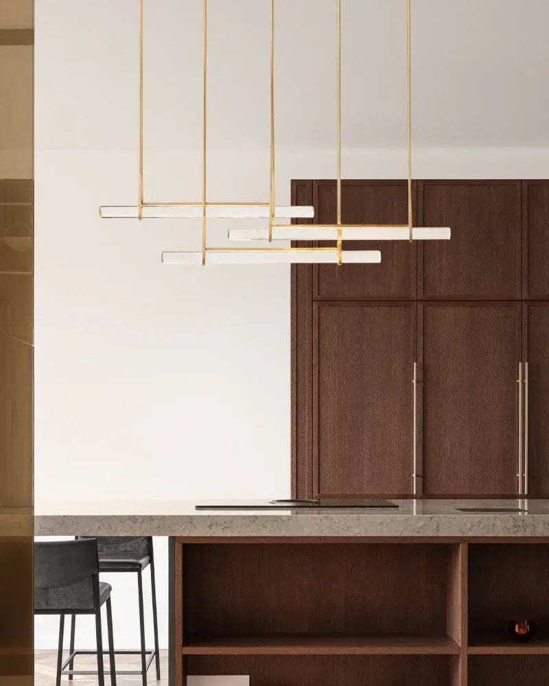 Valence Series Prismatic Chandelier | Vertical Brass Drops Meticulously crafted clear prisms and structural brass, Warm metallic brass finish for Dining Rooms and Living Areas American chandelier