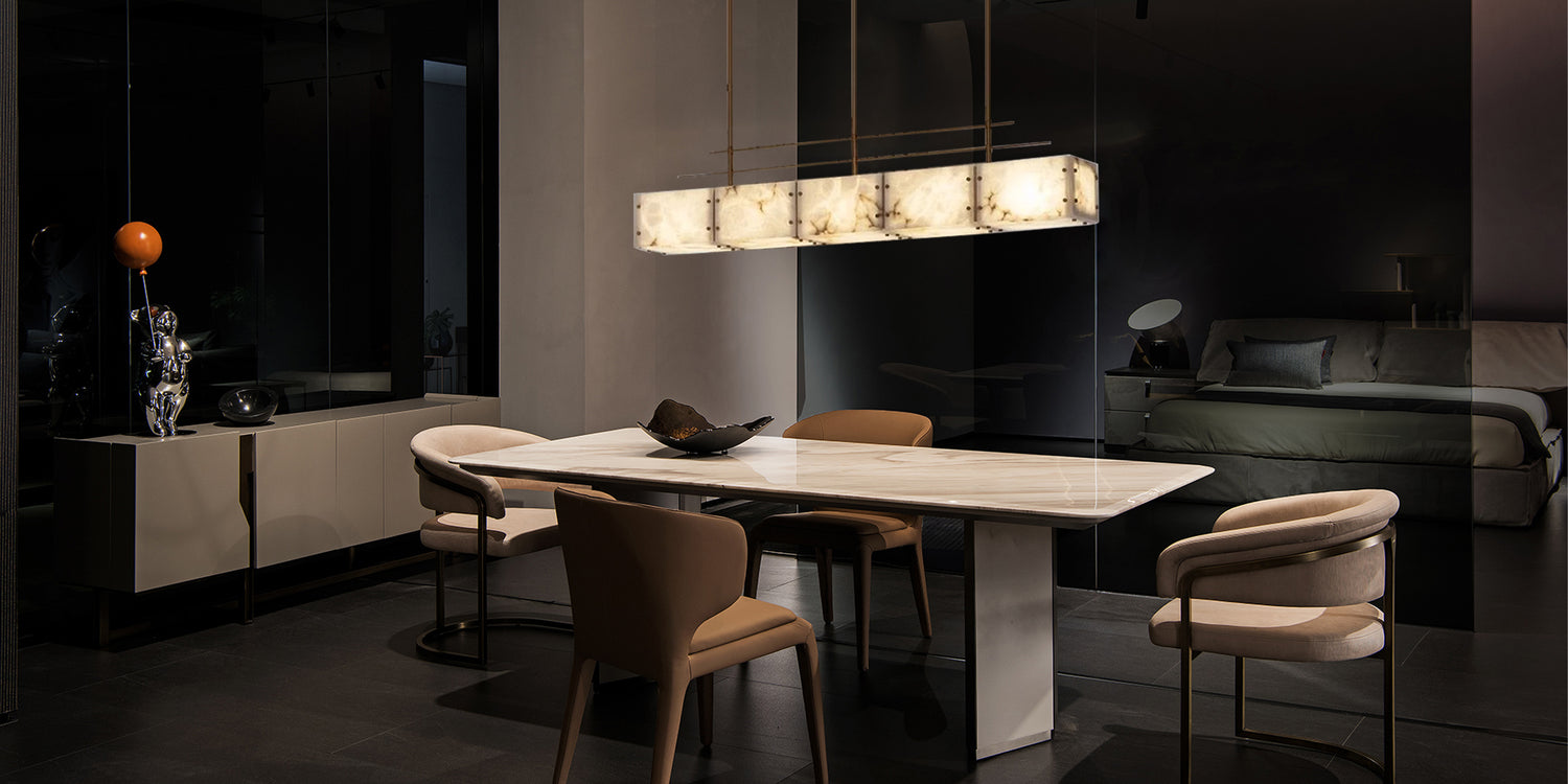 Modern dining room with a stylish dining room light above a sleek table and elegant chairs