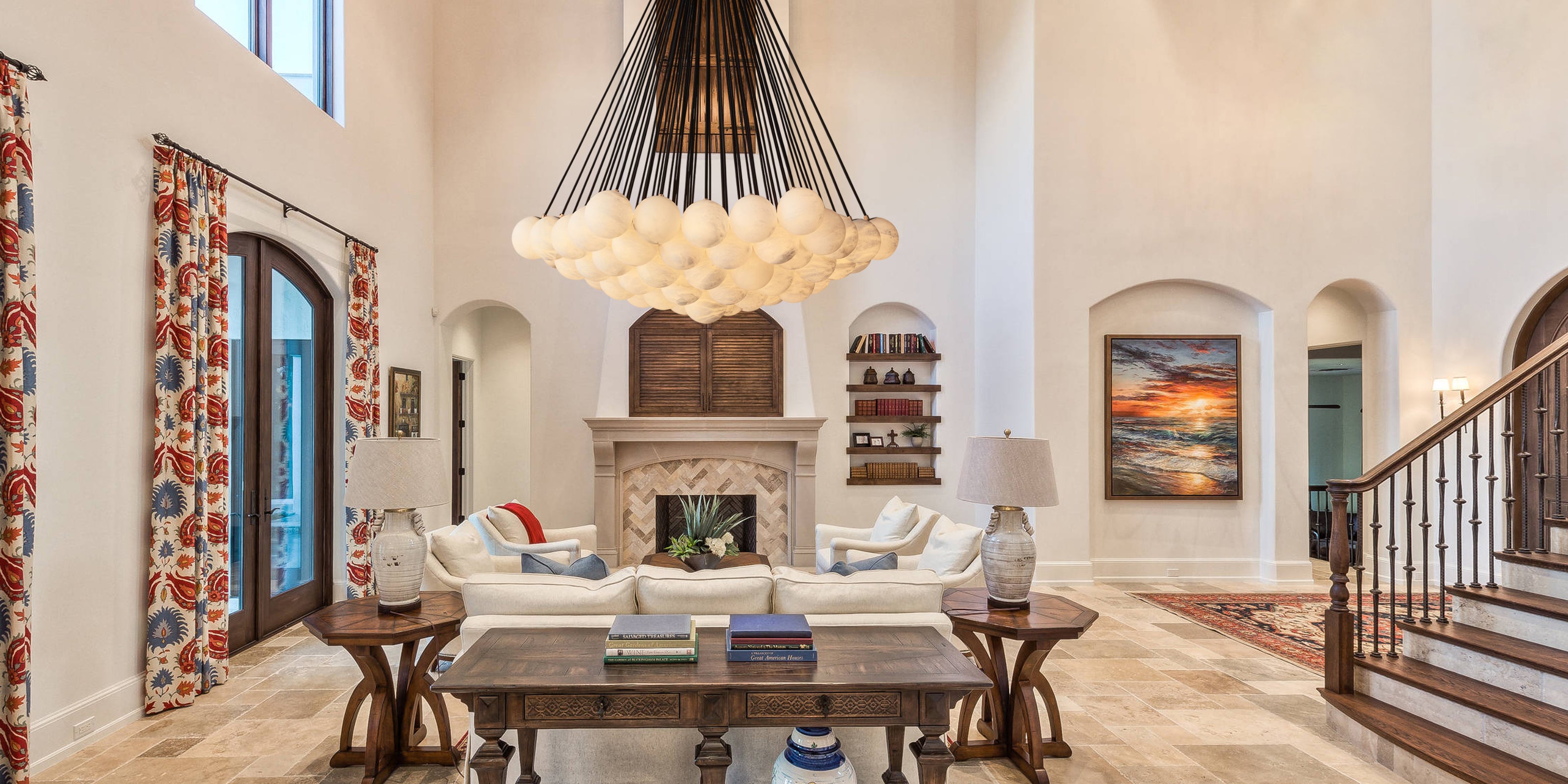 A stylish pendant light hangs in a bright living room