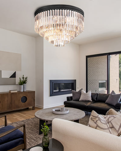 A luxurious chandelier as the modern ceiling light centerpiece in a contemporary living space