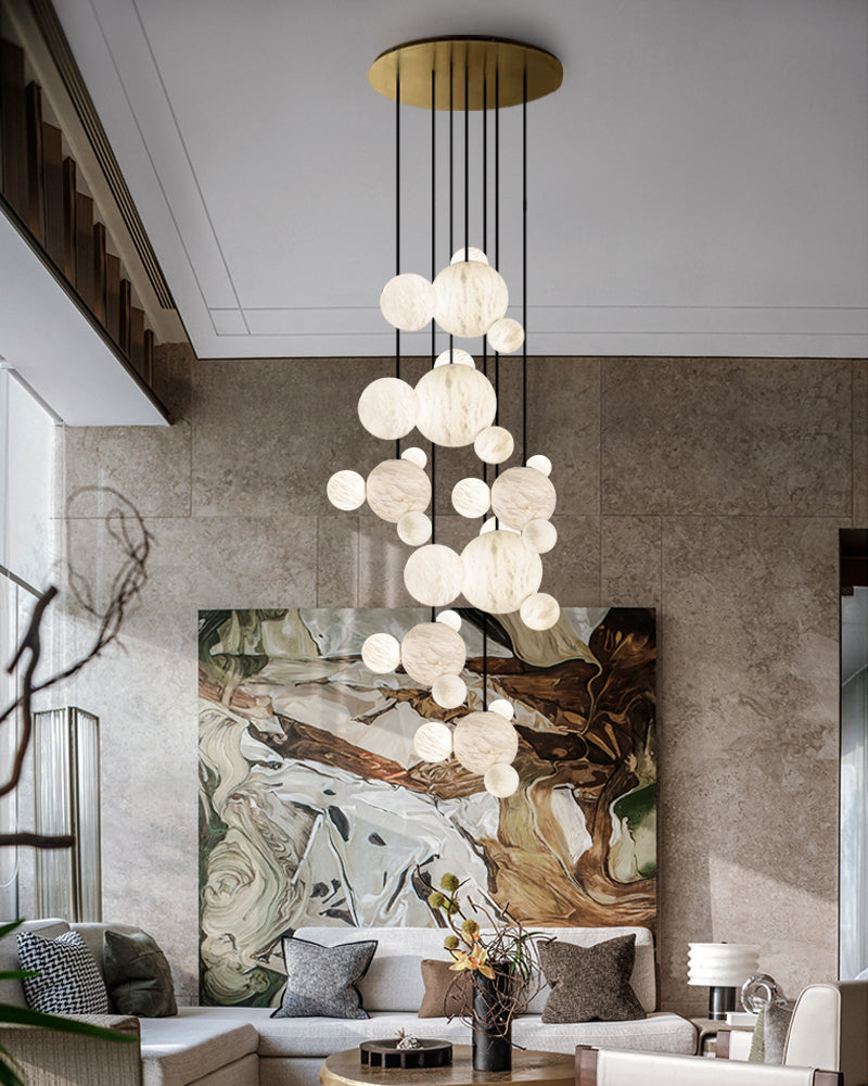 Cluster Alabaster Pendant Lamp with four different sizes of marble ball neatly supported on metal pole