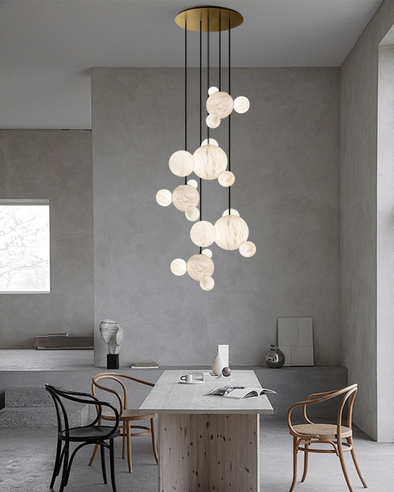 Cluster Alabaster Pendant Lamp with four different sizes of marble ball neatly supported on metal pole