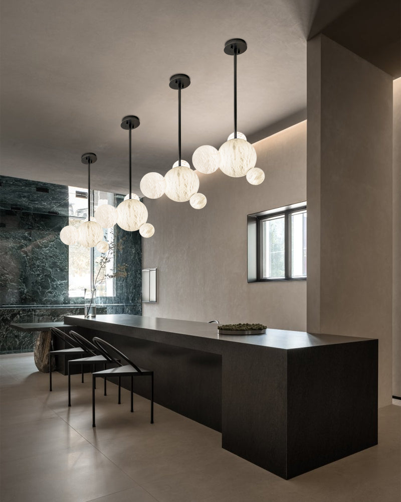 Cluster Alabaster Pendant Lamp with four different sizes of marble ball neatly supported on metal pole