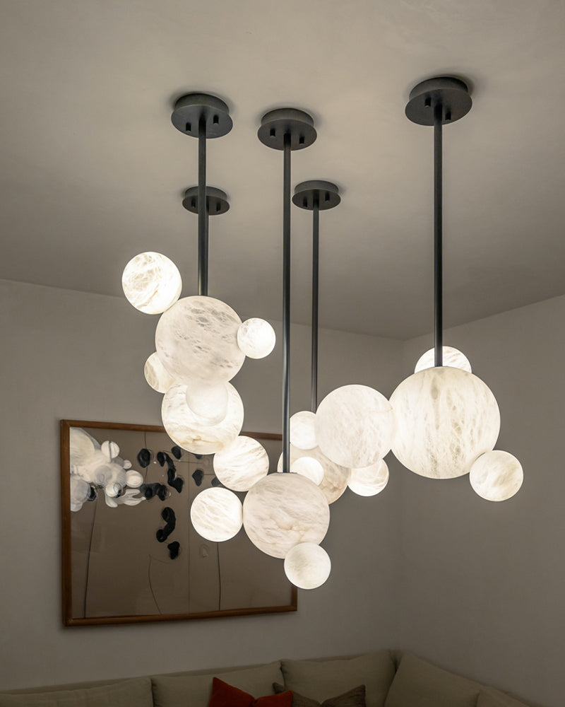 Cluster Alabaster Pendant Lamp with four different sizes of marble ball neatly supported on metal pole