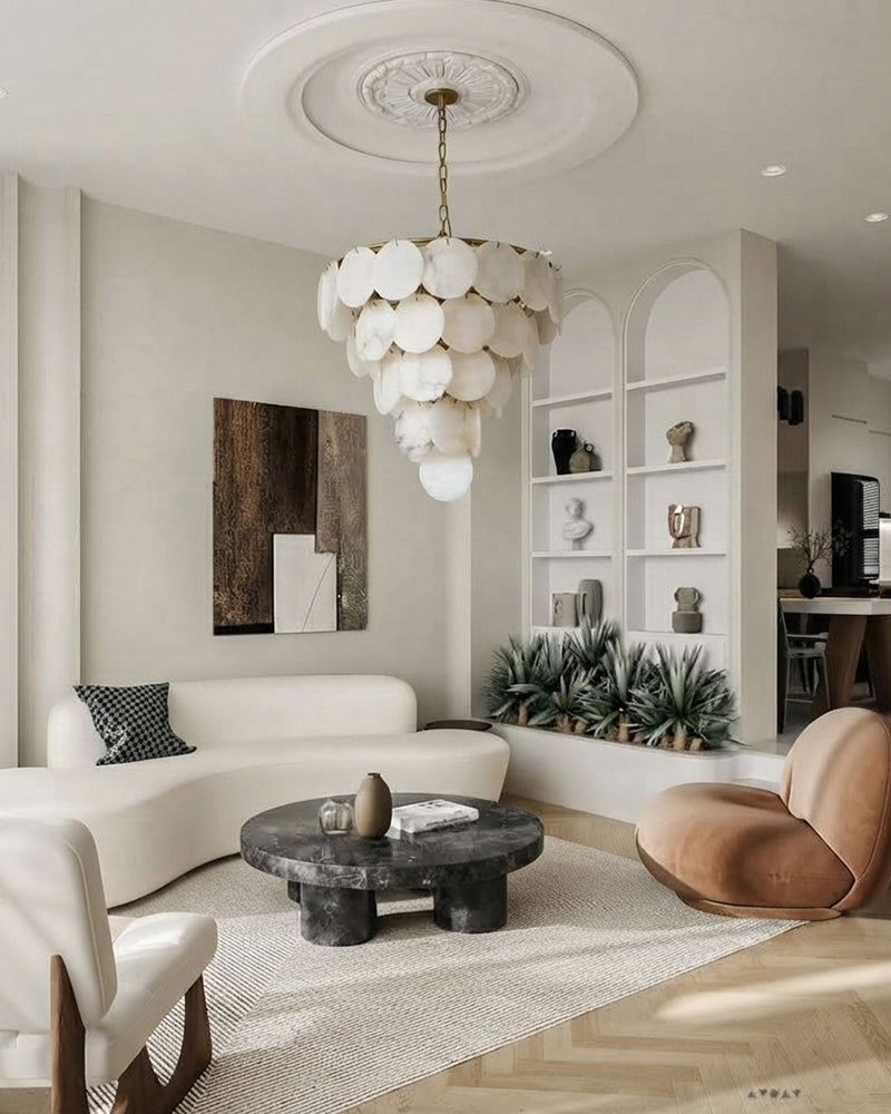 Scalloped multi-tier alabaster disc chandelier pendant with gold chain and discs.