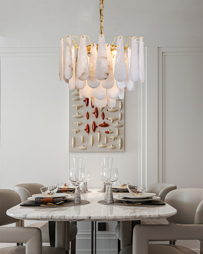 21.7" tiered raindrop chandelier enhancing a stylish modern dining room