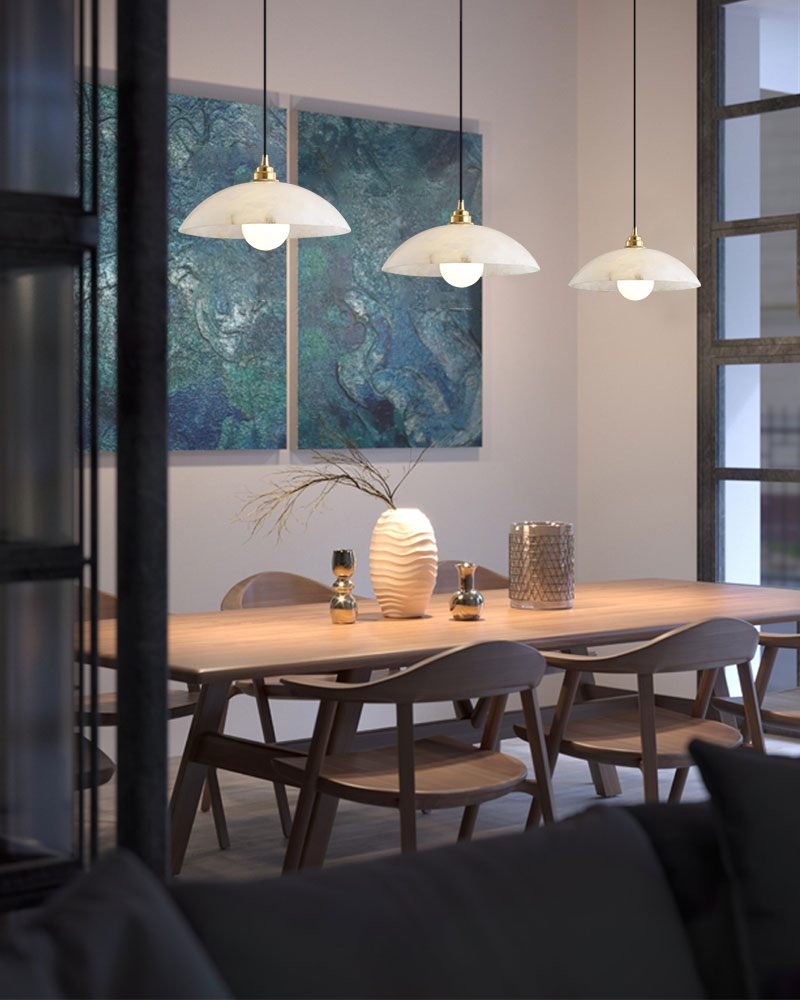 Modern dining room with natural stone pendant lamps and stylish decor.