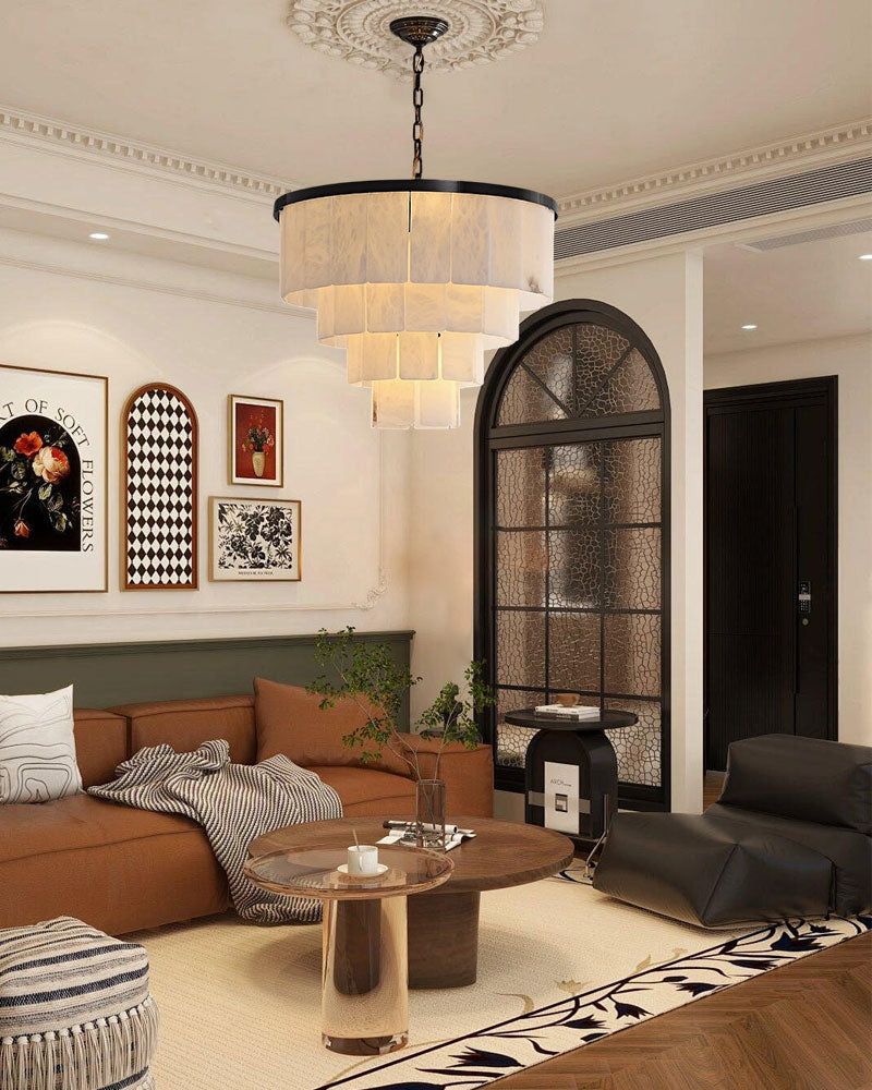 Chic 7-layer alabaster chandelier adding elegance to a cozy modern living room.