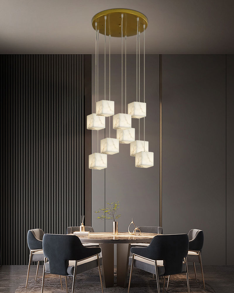 Modern white alabaster square chandelier above a chic dining table with stylish chairs