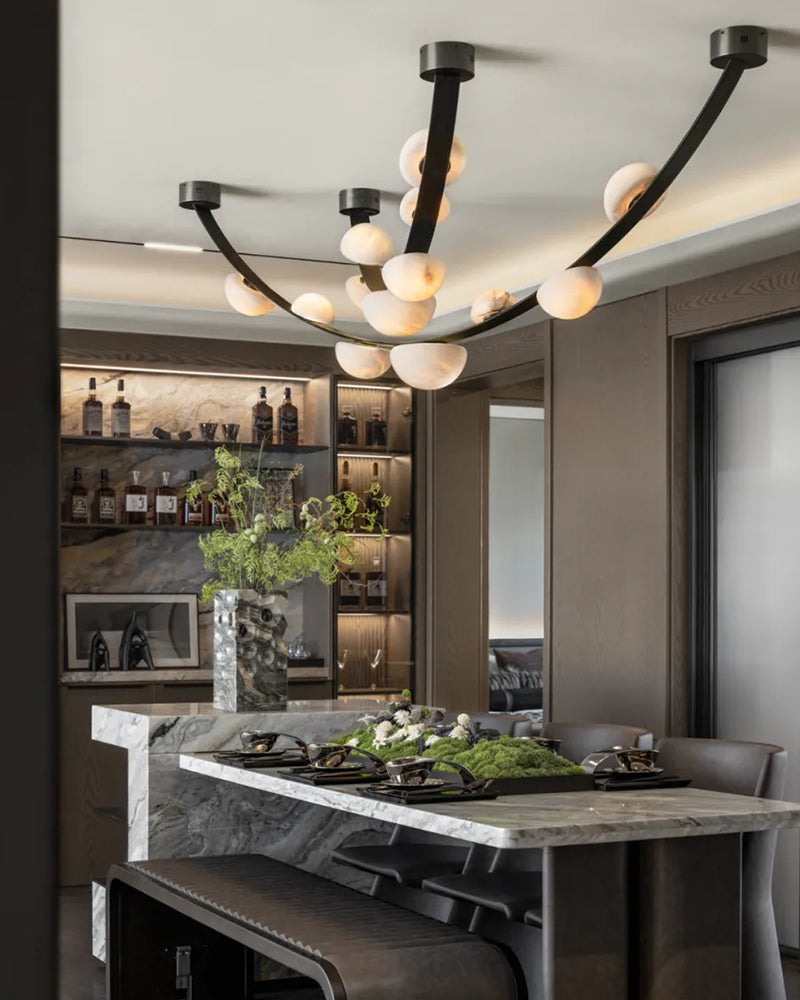 Leather pendant lamps with semicircular marble diffusers on a U-shaped strip metal base