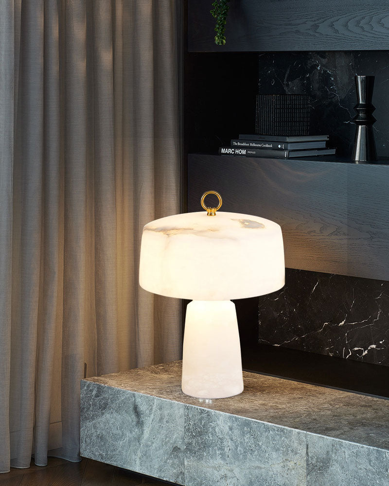 G9 natural stone table lamp with a sleek design on gray marble surface.