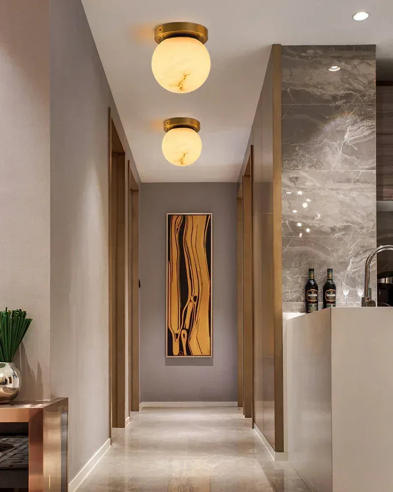 LightsStory Series Geometric Ceiling Light | Alabaster Orb Genuine alabaster with soft veining and polished brass frame, Polished Brass finish for Entryways, bedrooms, and living rooms Flush Mounted Ceiling Lamp
