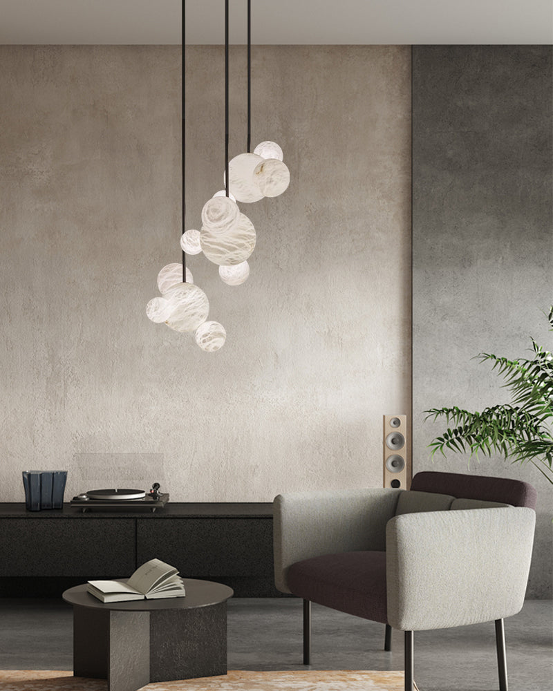 Cluster Alabaster Pendant Lamp with four different sizes of marble ball neatly supported on metal pole