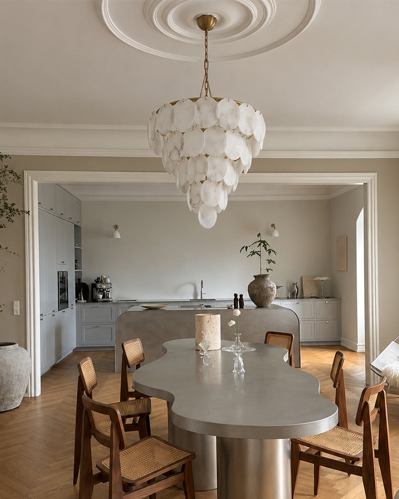 Hanging alabaster disc chandelier with multi-tier scalloped design and gold chain.