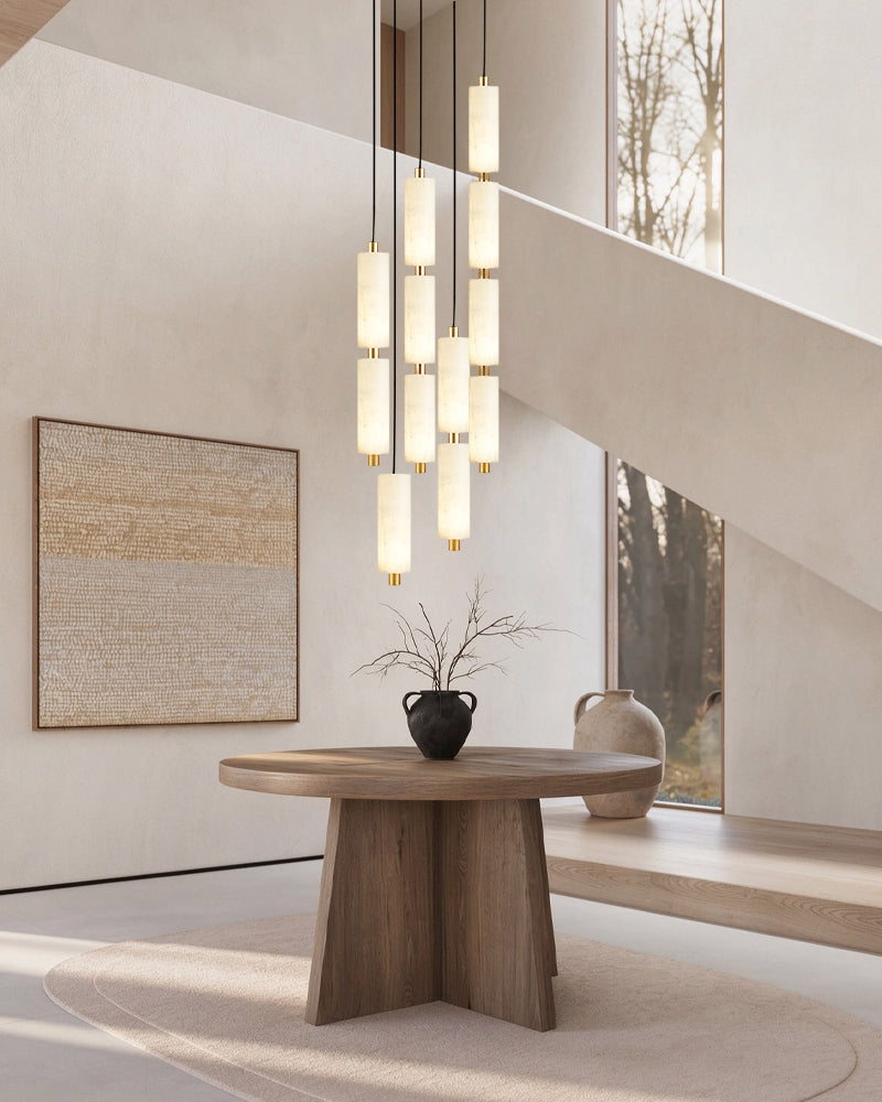 Brass pendant light cluster with multiple vertical alabaster cylinder glass shades