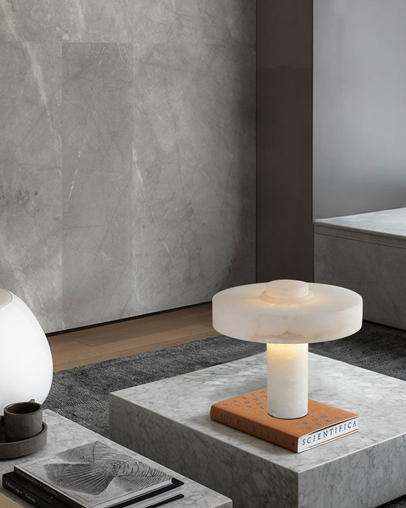 E27 alabaster round table lamp showcasing warm glow on a sleek marble surface