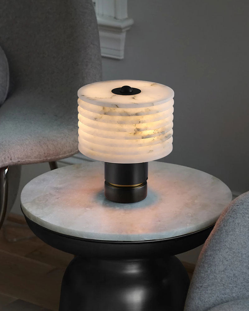 Vintage modern G9 Cloud marble table lamp on a round side table