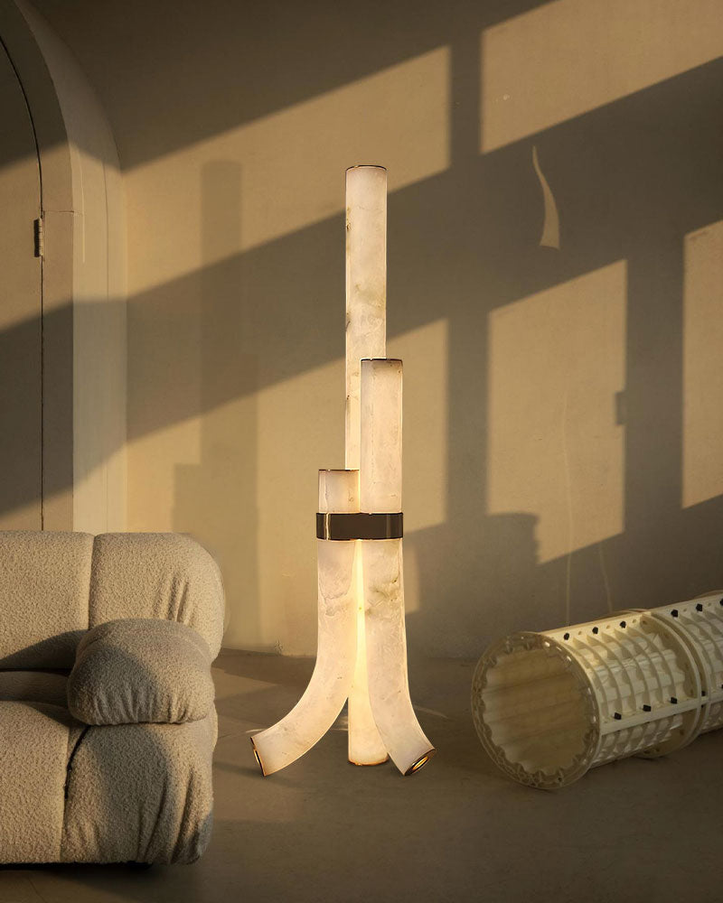 Contemporary alabaster floor lamp with geometric design and warm glow