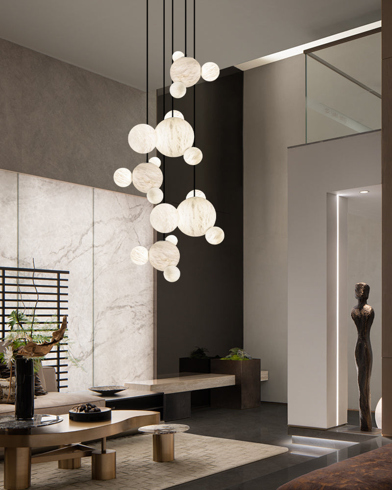 Cluster Alabaster Pendant Lamp with four different sizes of marble ball neatly supported on metal pole