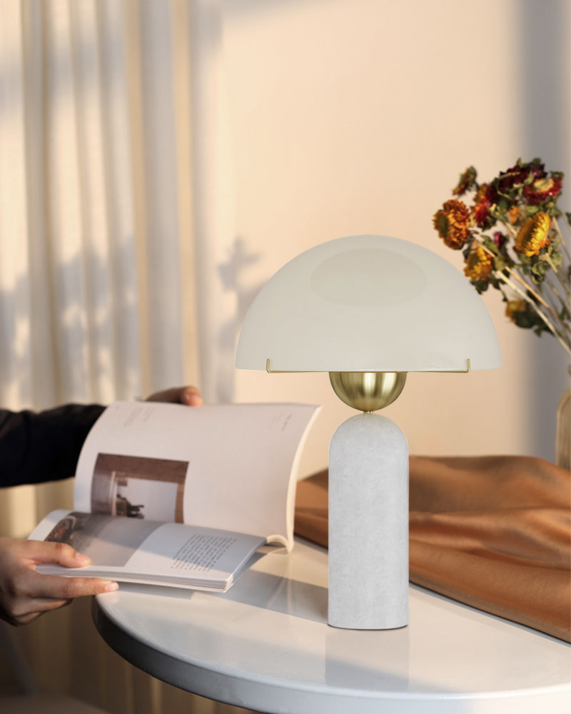 G9 Alabaster marble table lamp with dome shade illuminating a reading space.