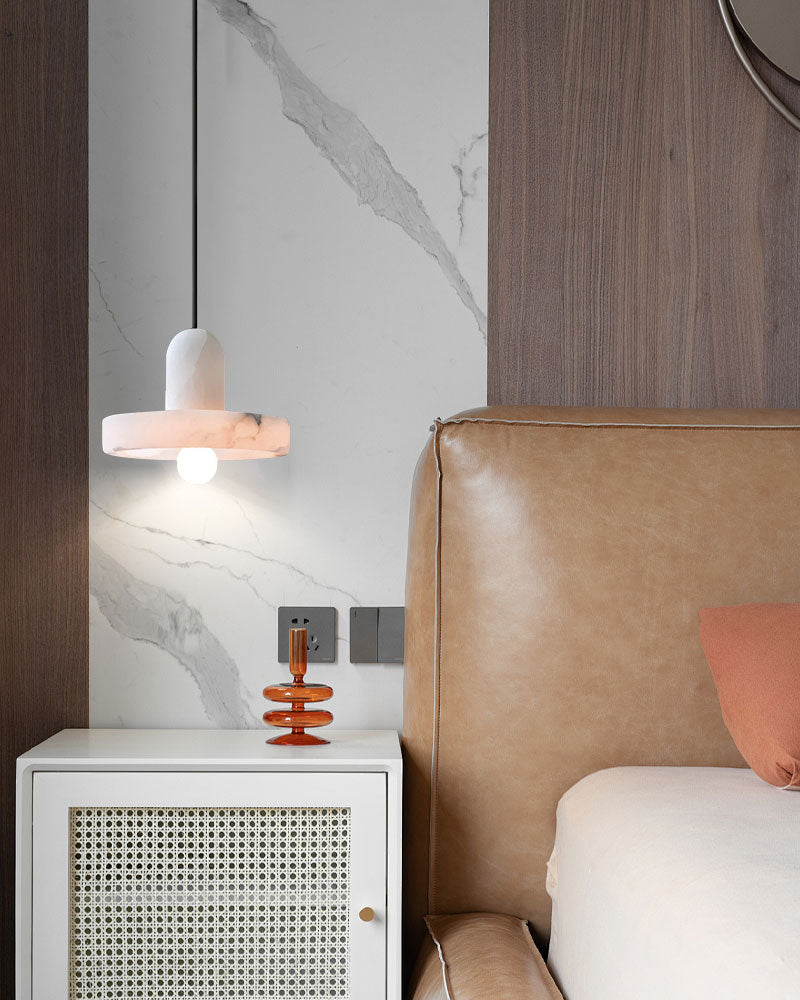 E27 alabaster pendant light over bedside table in modern bedroom with leather headboard