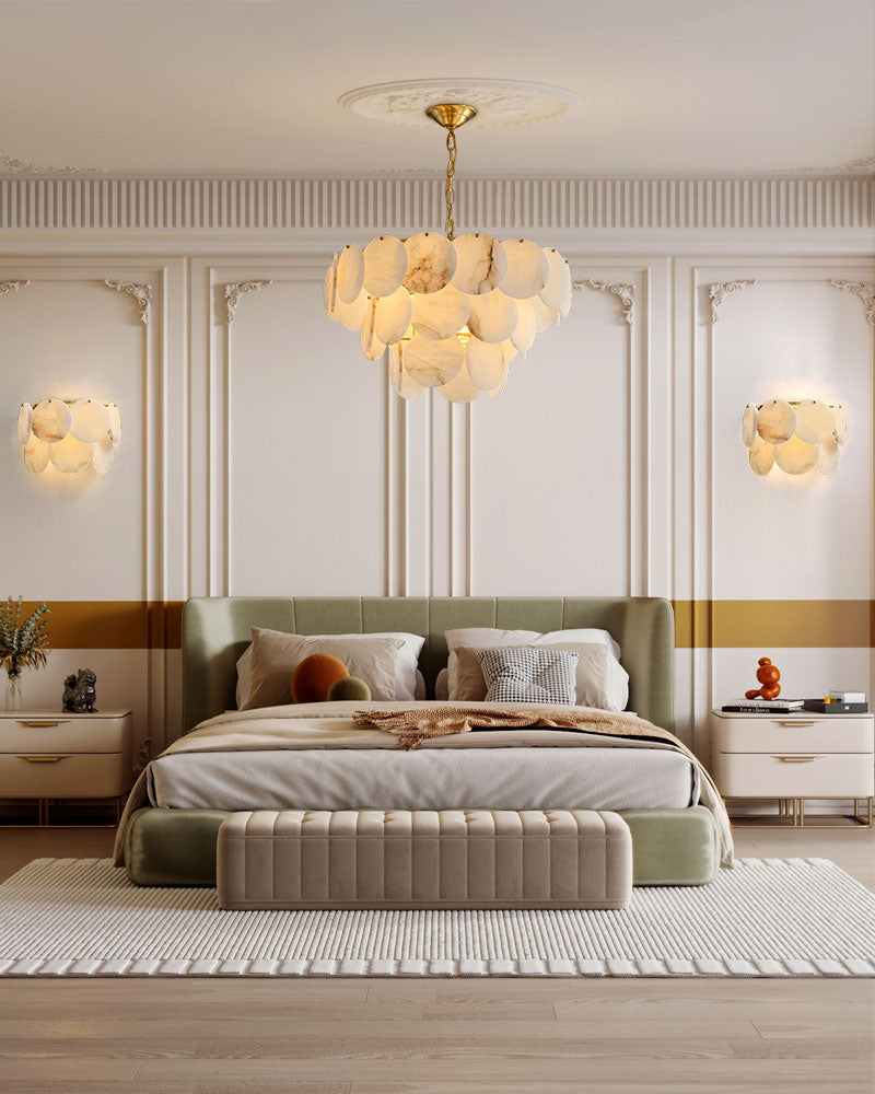 Elegant bedroom with Spanish Alabaster Shell lamp and brass chandelier