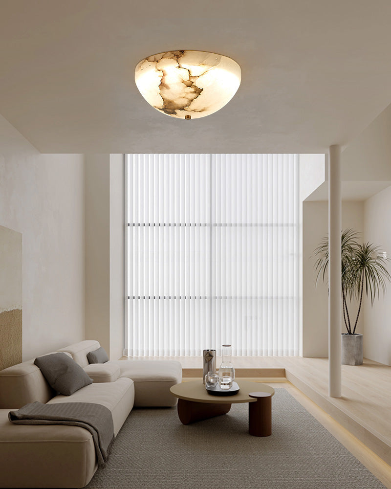 Elegant living room with LED alabaster ceiling sconce illuminating modern decor