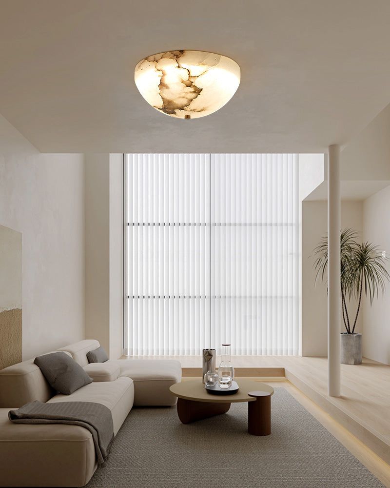 Elegant living room with LED alabaster ceiling sconce illuminating modern decor