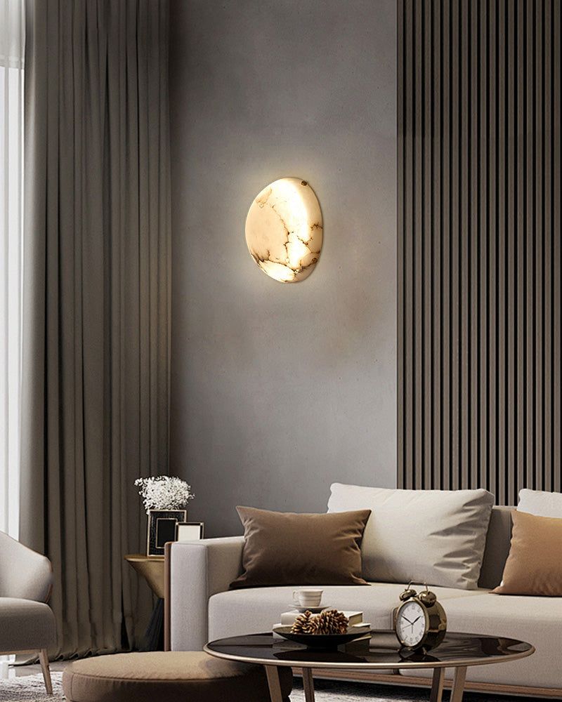 LED alabaster wall sconce lamp in a modern living room setting