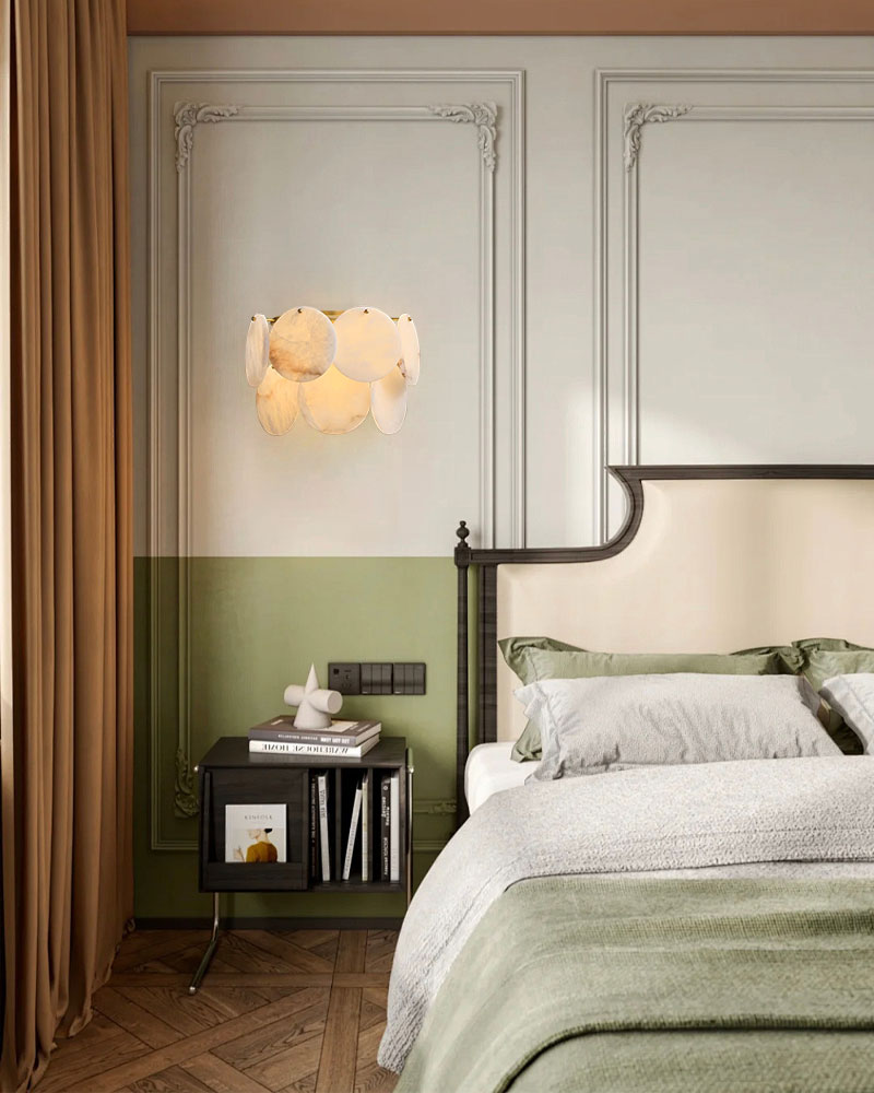 Luxurious bedroom featuring Spanish Alabaster Shell flush mount wall sconce in brass