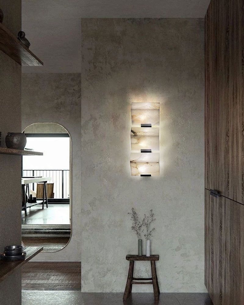 Minimalist LED alabaster wall sconce with geometric design in modern interior setting
