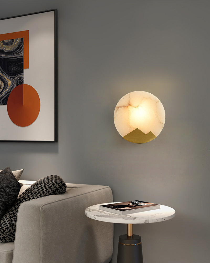 Nordic alabaster LED wall sconce with mountain design in contemporary living room decor