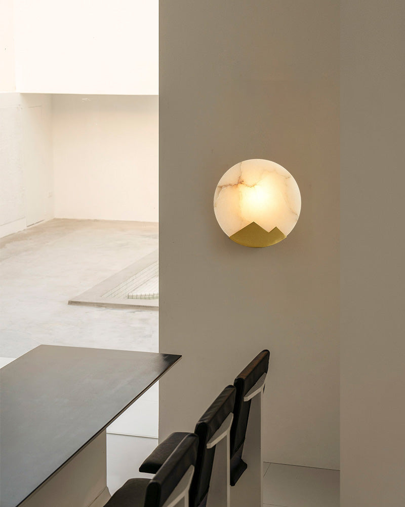 Nordic alabaster marble LED wall sconce with mountain design illuminating modern interior