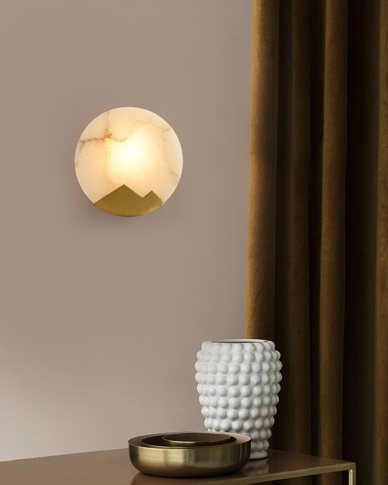 Nordic alabaster marble LED wall sconce with mountain design in elegant interior setting