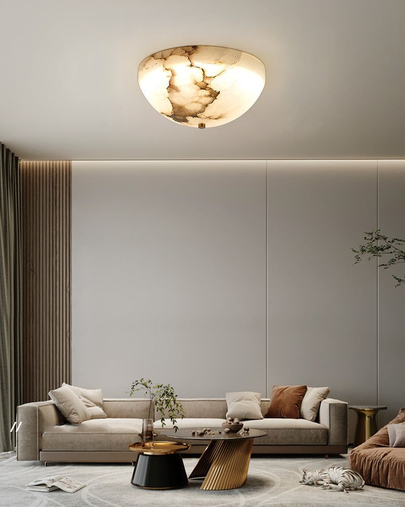 Round alabaster ceiling light in a modern living room with elegant decor